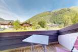 Enjoy breathtaking mountain views from this charming property.