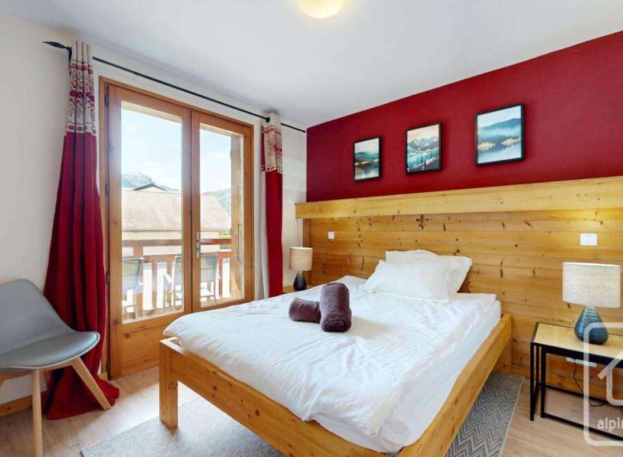 Discover the charm of this cozy bedroom, perfect for a relaxing getaway.