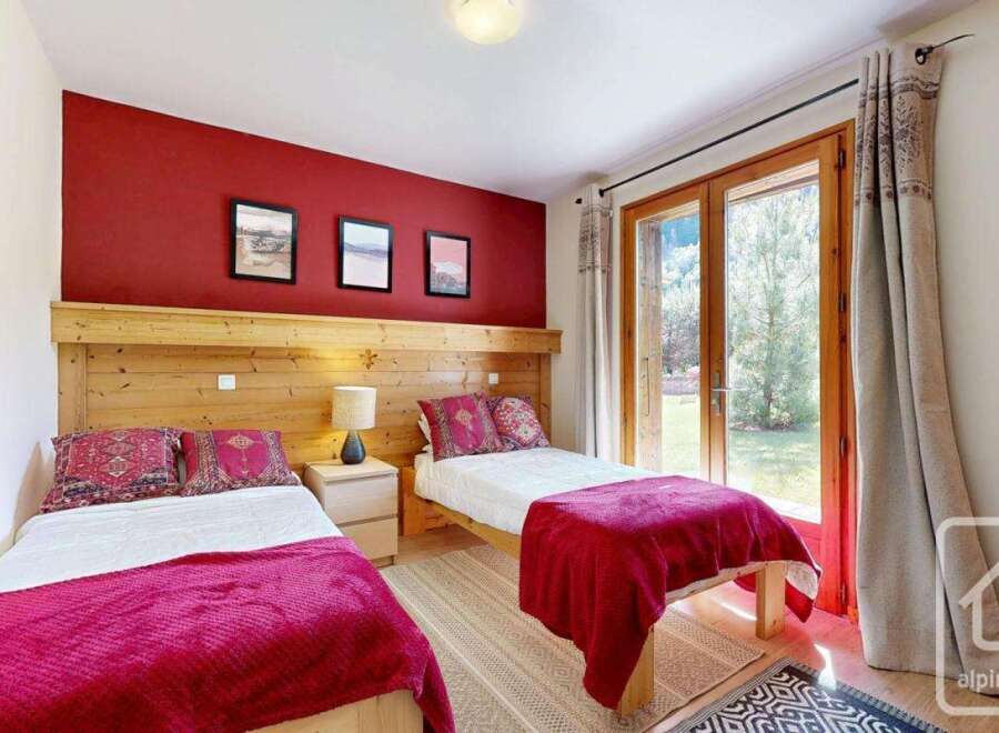 Discover the charm of this cozy bedroom, perfect for a relaxing getaway.