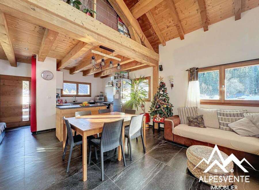 Discover the charm of this stunning property, featuring a beautifully designed interior with exposed wooden beams and a cozy ambiance.