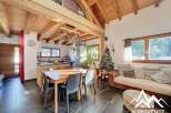 Discover the charm of this stunning property, featuring a beautifully designed interior with exposed wooden beams and a cozy ambiance.