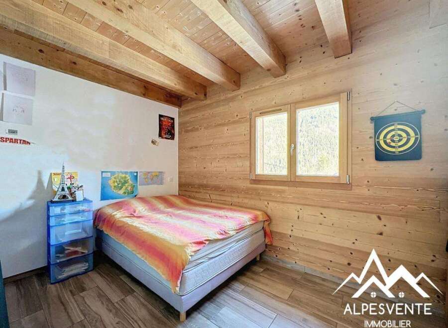 Discover a cozy bedroom retreat in this charming property.