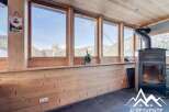 Experience the warmth of this charming chalet with stunning mountain views.