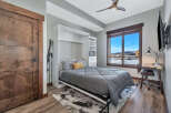 This cozy bedroom features a Murphy bed, maximizing space and offering versatility.