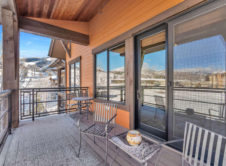 Enjoy breathtaking mountain views from this stunning balcony.