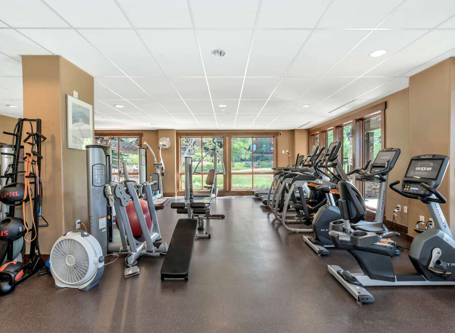 This well-equipped gym offers a variety of workout options for residents.