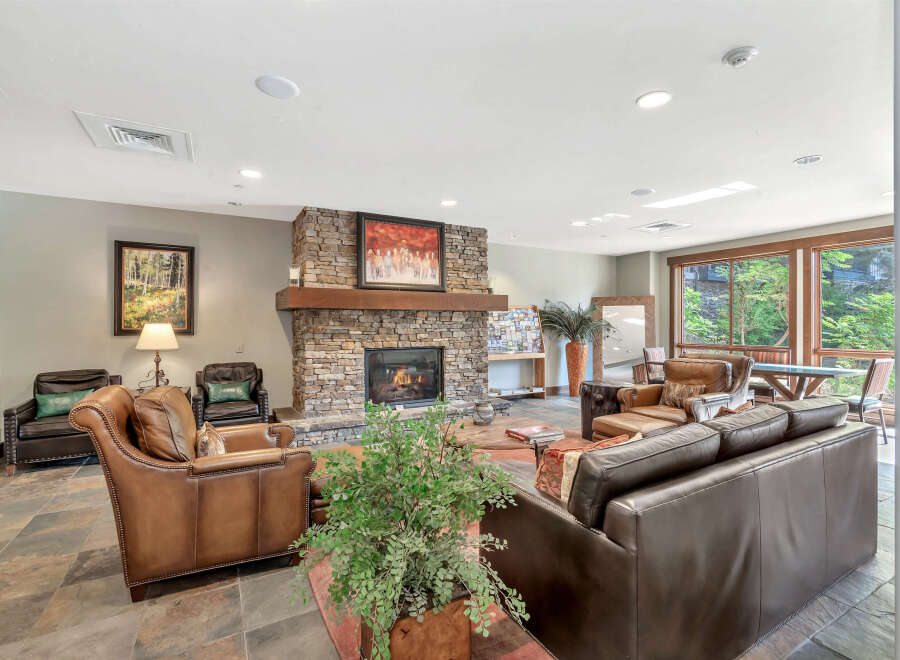 Experience luxury living in this stunning property featuring a cozy fireplace, perfect for chilly evenings.
