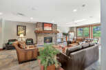 Experience luxury living in this stunning property featuring a cozy fireplace, perfect for chilly evenings.