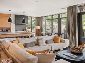 Experience luxury living in this stunning property, featuring a spacious open-concept design perfect for entertaining.