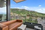 Enjoy breathtaking mountain views from this luxurious balcony.