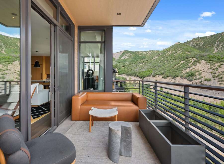 Enjoy breathtaking mountain views from this luxurious outdoor space.