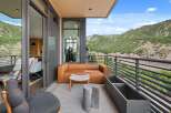 Enjoy breathtaking mountain views from this luxurious outdoor space.