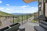 Enjoy breathtaking mountain views from this luxurious balcony.