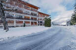Discover a charming property nestled in a winter wonderland.