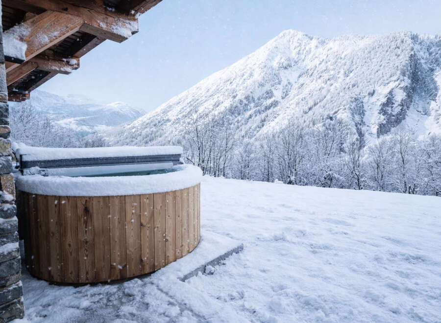 Experience the ultimate winter escape with this stunning property featuring a luxurious hot tub.