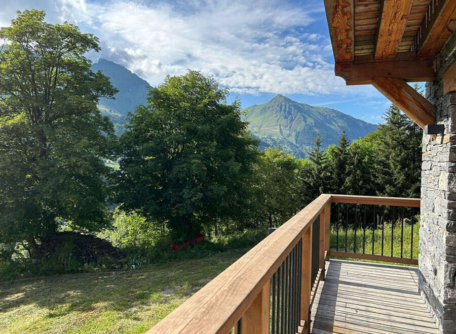 Experience breathtaking mountain views from this charming chalet's private balcony, perfect for enjoying your morning coffee or evening relaxation.