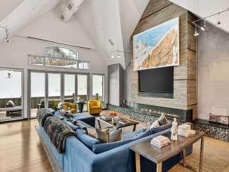 Experience luxury living in this stunning property featuring a modern living room.
