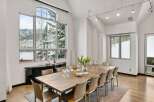 Experience luxury living in this stunning property, featuring a spacious dining area with breathtaking mountain views.