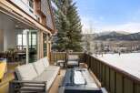 Experience luxury living with this stunning property featuring a spacious outdoor deck perfect for enjoying the winter wonderland.