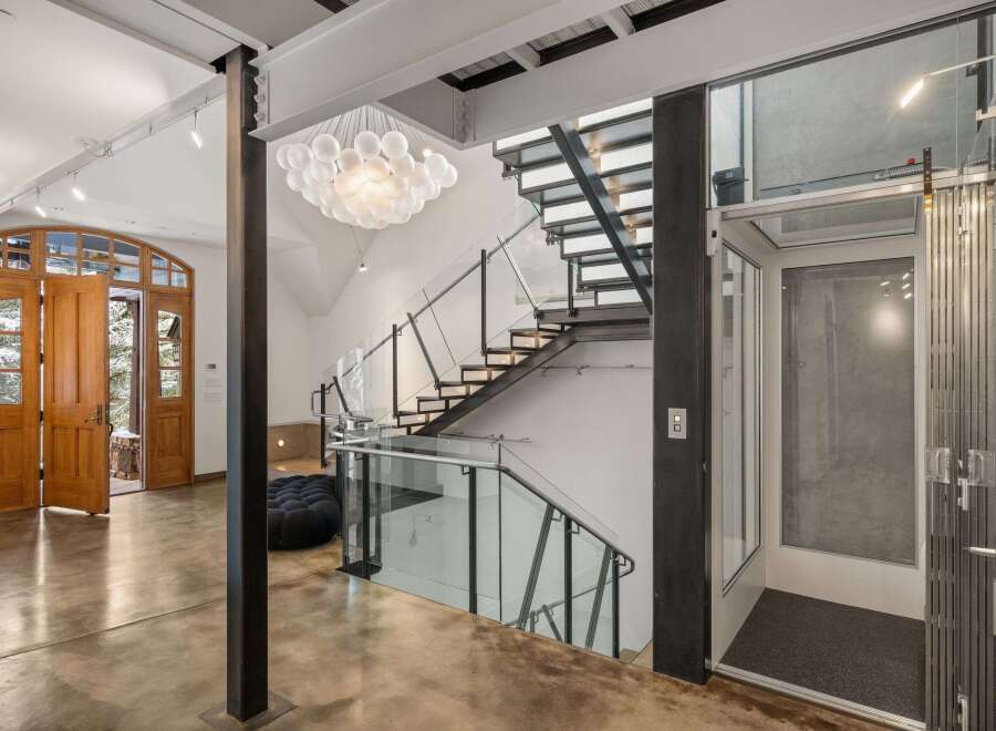 This stunning property boasts a modern interior with an open floor plan and high-end finishes.
