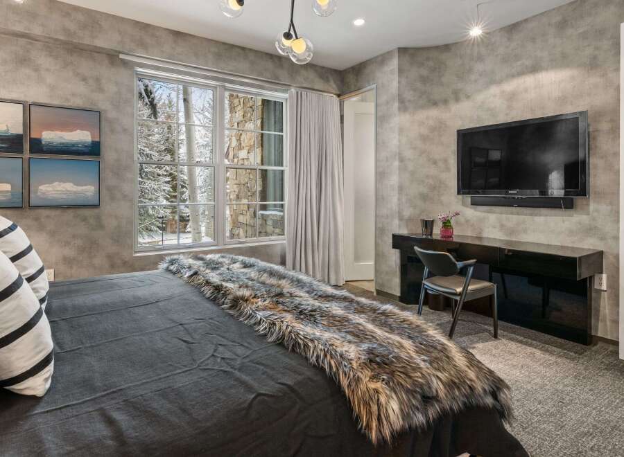 Experience luxury and comfort in this stunning bedroom.