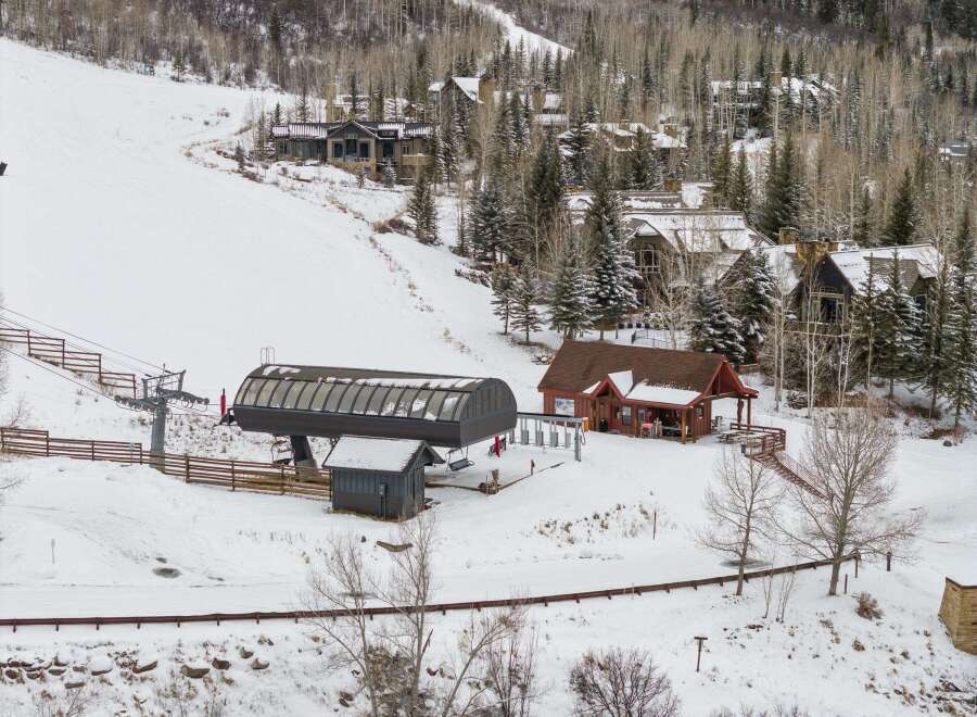 Nestled in a winter wonderland, this property offers stunning views and a prime location.