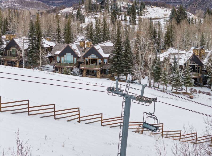 Luxury mountain homes nestled in a winter wonderland.