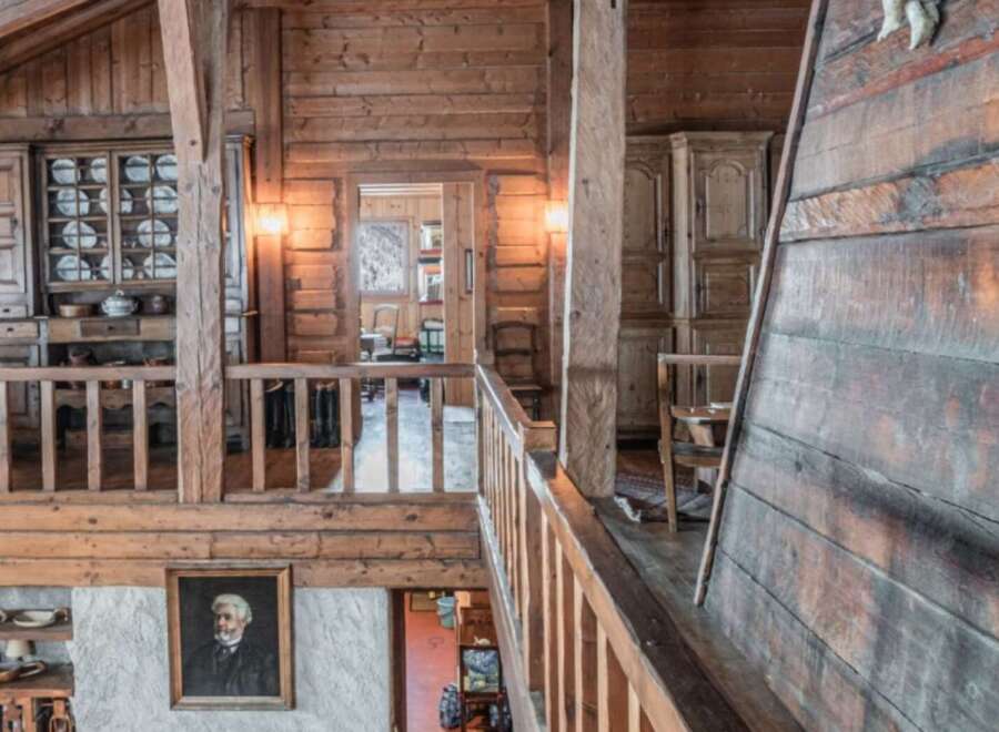 Step into rustic elegance with this stunning property, showcasing exquisite wooden architecture.