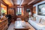 Step into a cozy retreat with this charming living space.