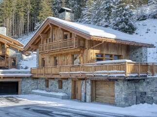 Experience the epitome of alpine luxury in this stunning wooden chalet.