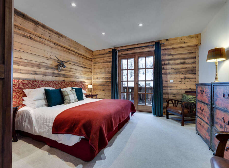 Experience rustic charm in this cozy bedroom.