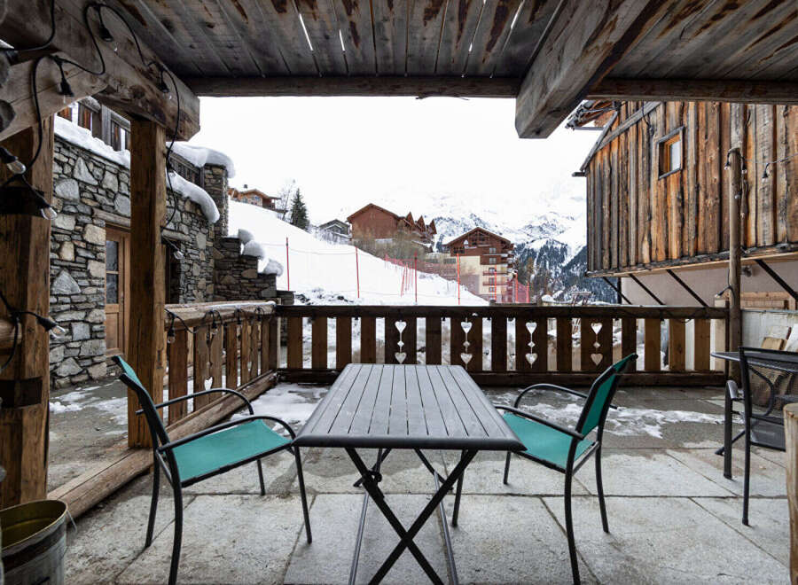 Enjoy breathtaking mountain views from this charming chalet.