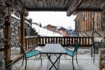 Enjoy breathtaking mountain views from this charming chalet.