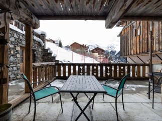 Enjoy breathtaking mountain views from this charming chalet.