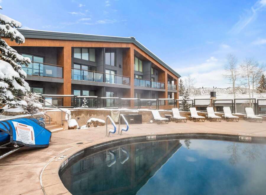 Enjoy a luxurious stay at this stunning property featuring a heated outdoor pool, perfect for relaxing in any season.