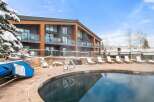 Enjoy a luxurious stay at this stunning property featuring a heated outdoor pool, perfect for relaxing in any season.