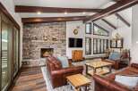 Experience luxury living in this stunning property featuring a cozy fireplace, perfect for chilly evenings.