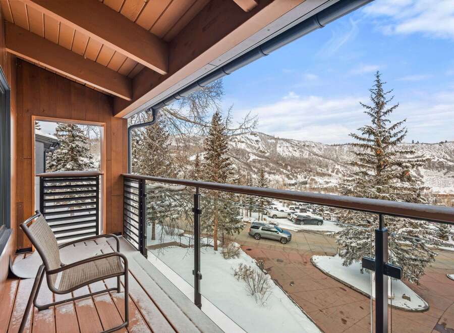 Enjoy breathtaking mountain views from this stunning balcony.