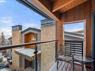 Enjoy breathtaking views from this luxurious balcony, perfect for relaxing and taking in the scenery.