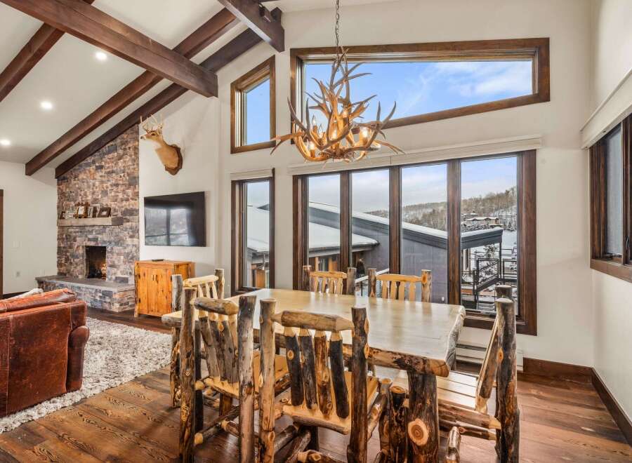This stunning property boasts a rustic yet elegant dining area, perfect for entertaining guests.