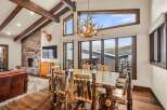 This stunning property boasts a rustic yet elegant dining area, perfect for entertaining guests.