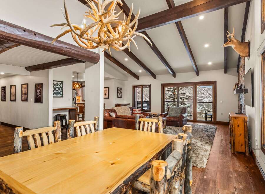 This stunning property boasts a rustic, yet elegant design, perfect for those seeking a mountain retreat.