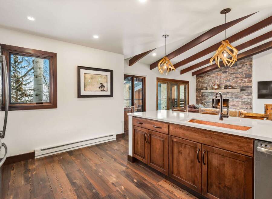 This stunning kitchen boasts a rustic yet modern design, perfect for entertaining.