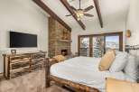 Experience the ultimate mountain retreat in this stunning bedroom.