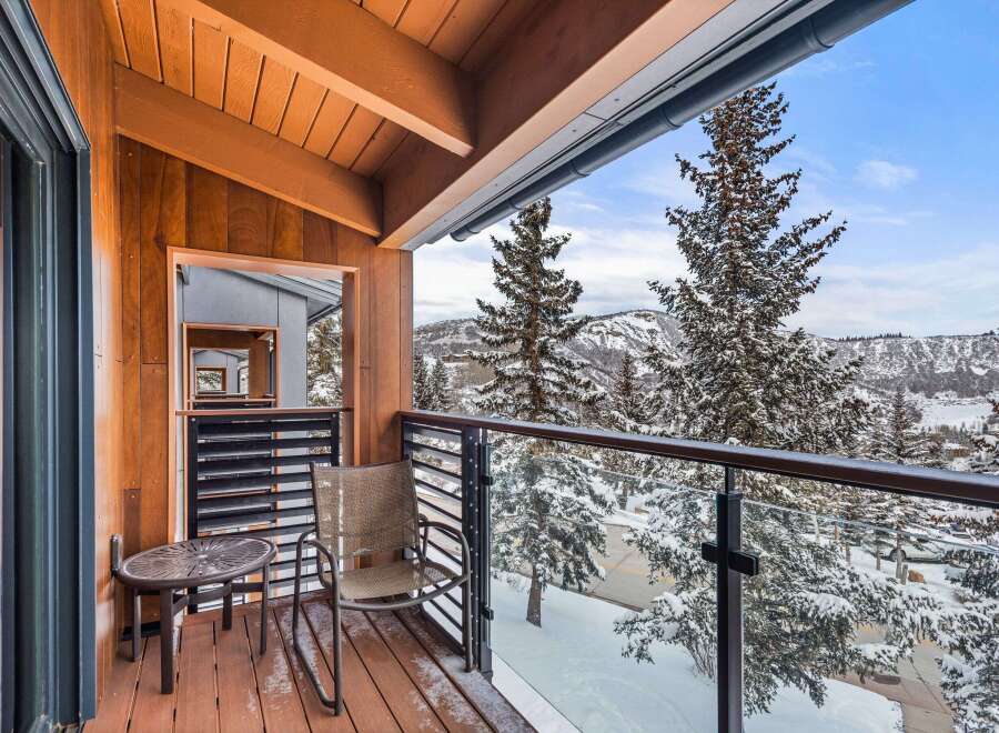 Enjoy breathtaking mountain views from this stunning balcony.