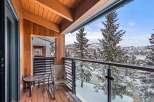 Enjoy breathtaking mountain views from this stunning balcony.