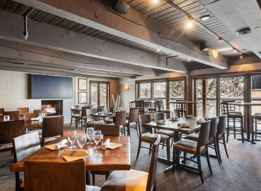 Step into a cozy and inviting restaurant with a rustic charm.