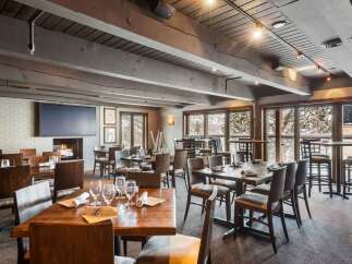 Step into a cozy and inviting restaurant with a rustic charm.