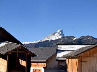 Nestled in a picturesque mountain setting, this charming property offers a unique blend of rustic charm and natural beauty.
