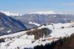 Nestled in a picturesque winter wonderland, this stunning property offers breathtaking views of snow-capped mountains and charming villages.